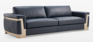 Elegant grey velvet tufted sofa by Flexi Seating Systems with golden legs, ideal for luxurious hotel lounges and suites. Hotel furniture manufacturer for bulk/single orders.